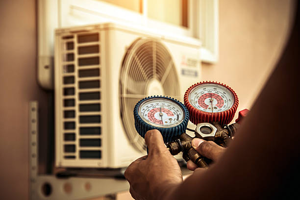 Professional Hvac technician working in Highland, CA